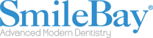 This image reflects the personalized care at SmileBay Dental, where a patient is guided through her treatment results by a professional dentist. Such one-on-one consultations are essential for helping patients understand their dental journey and feel confident in their smile transformation.
